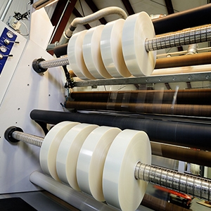 Toll Slitting, Lamination And Corona Treatment Toll Slitting, Lamination And Corona Treatment